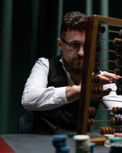 A man using an abacus